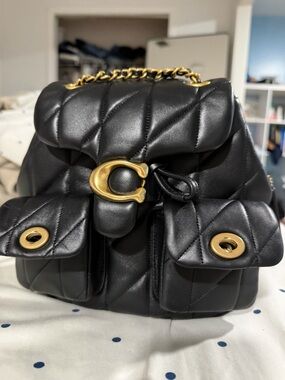 Black Quilted Leather Backpack with Gold Hardware